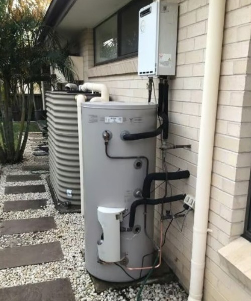 Hot water system on the outside of a house